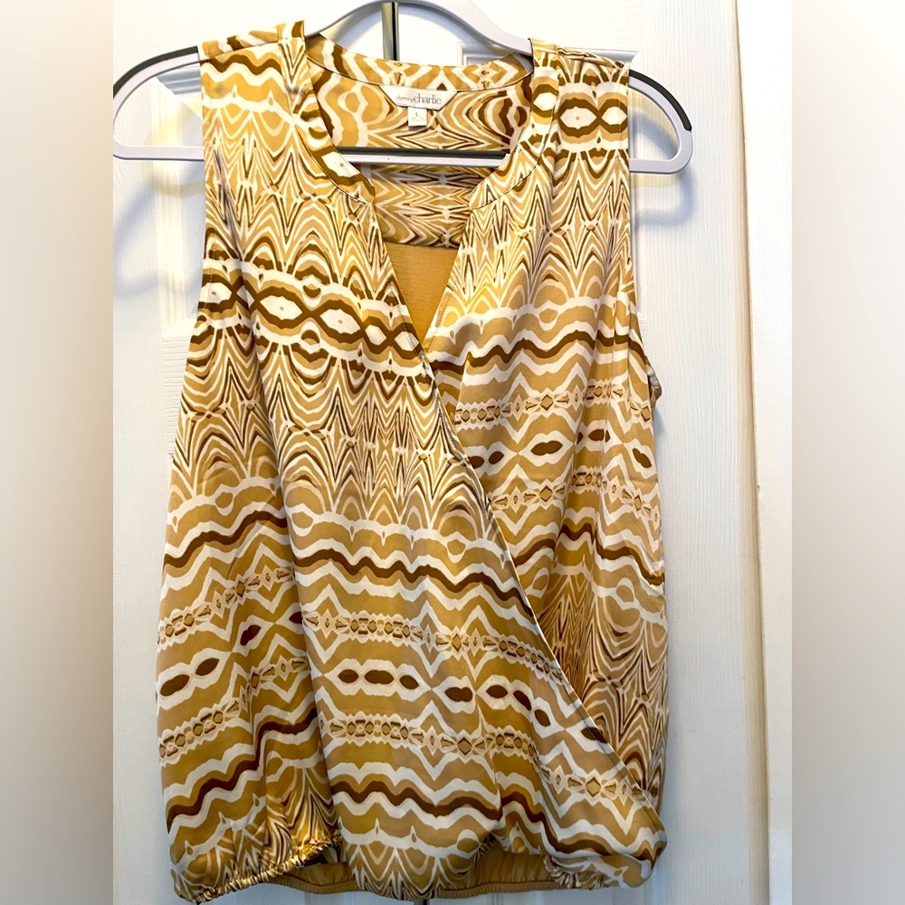 Beige and brown print top.